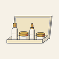 Drawing of an open gift box holding four face care products